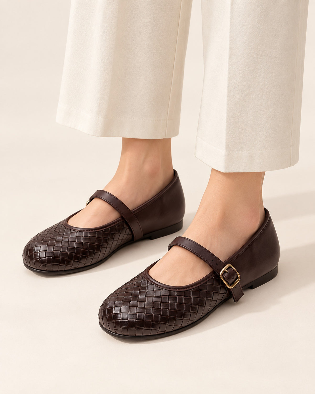 Adèle woven leather Mary Jane flat with buckle strap in Brown, worn
