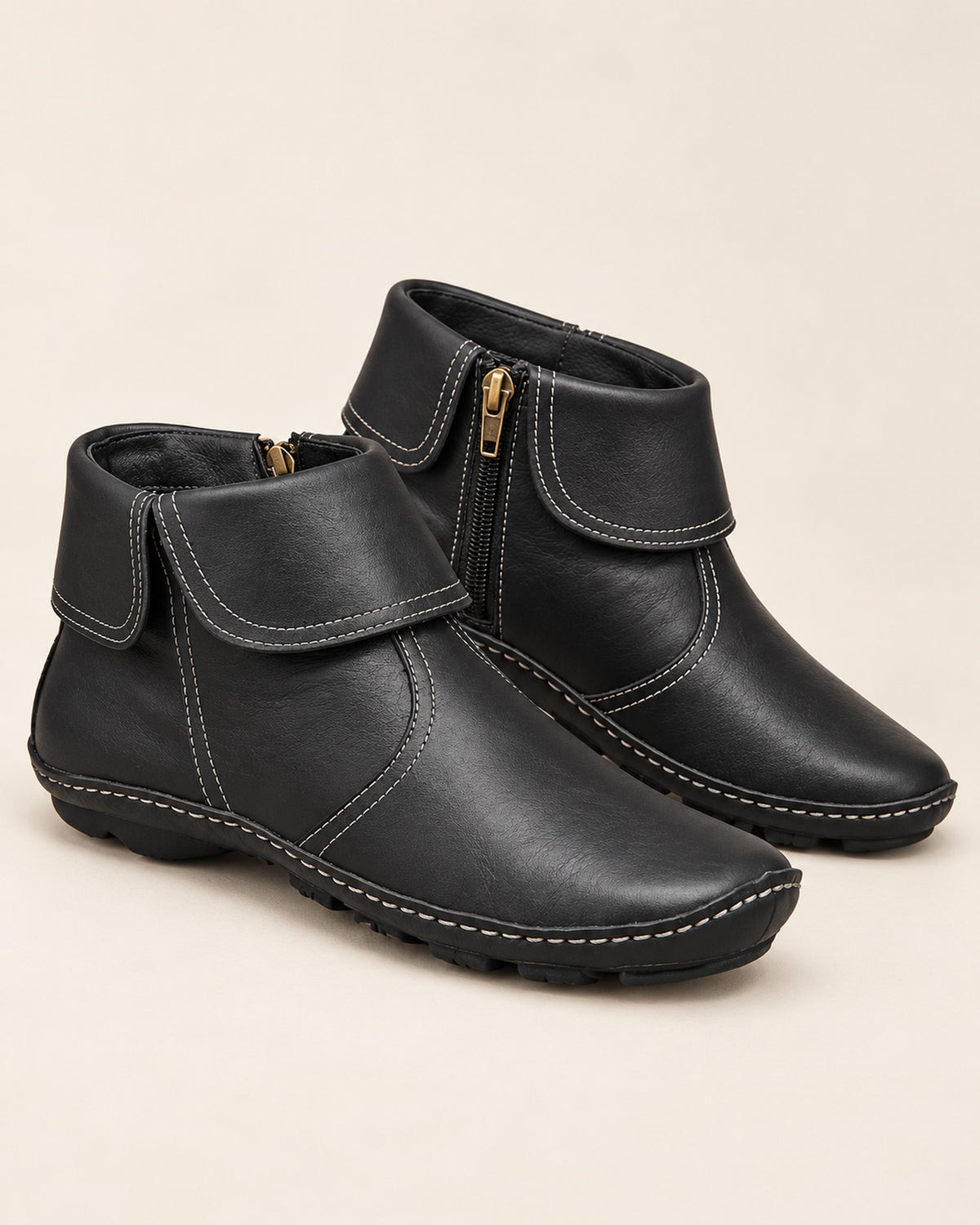 Margaux fold-over cuff ankle boot with side zip in Black, three-quarter view