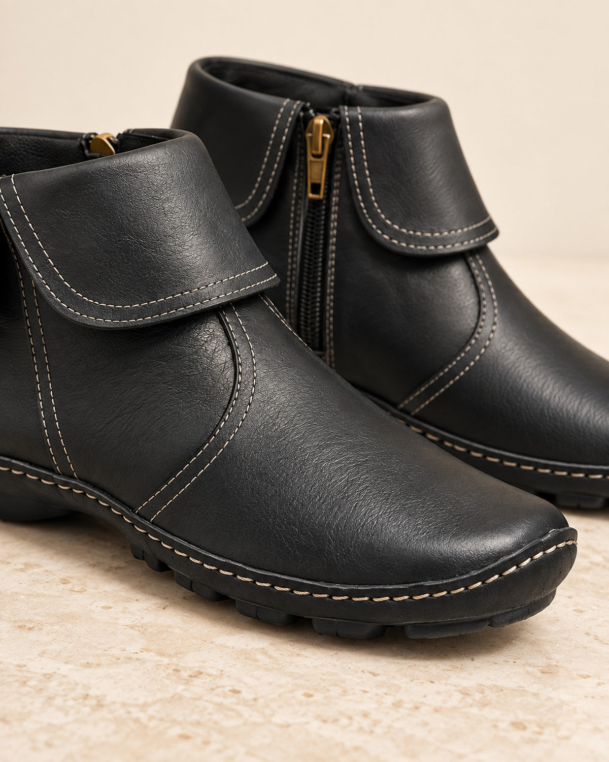 Margaux fold-over cuff ankle boot with side zip in Black, close-up detail