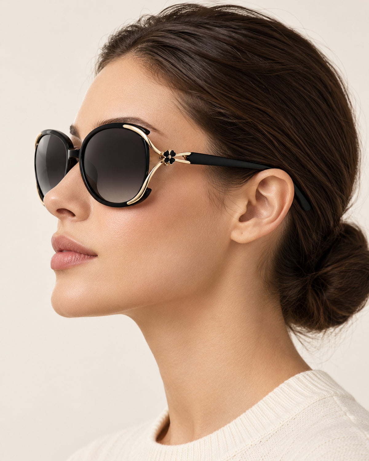 Chiara cat-eye sunglasses in black frame, gray gradient lenses, worn