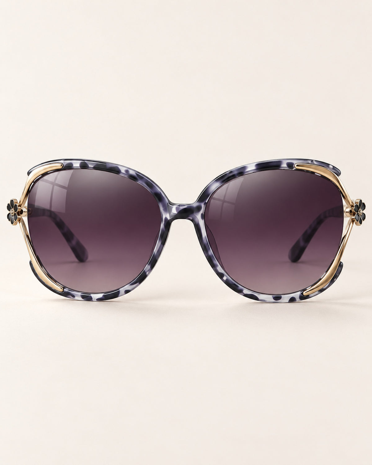 Chiara cat-eye sunglasses in striped marble frame, purple gradient lenses, hero view