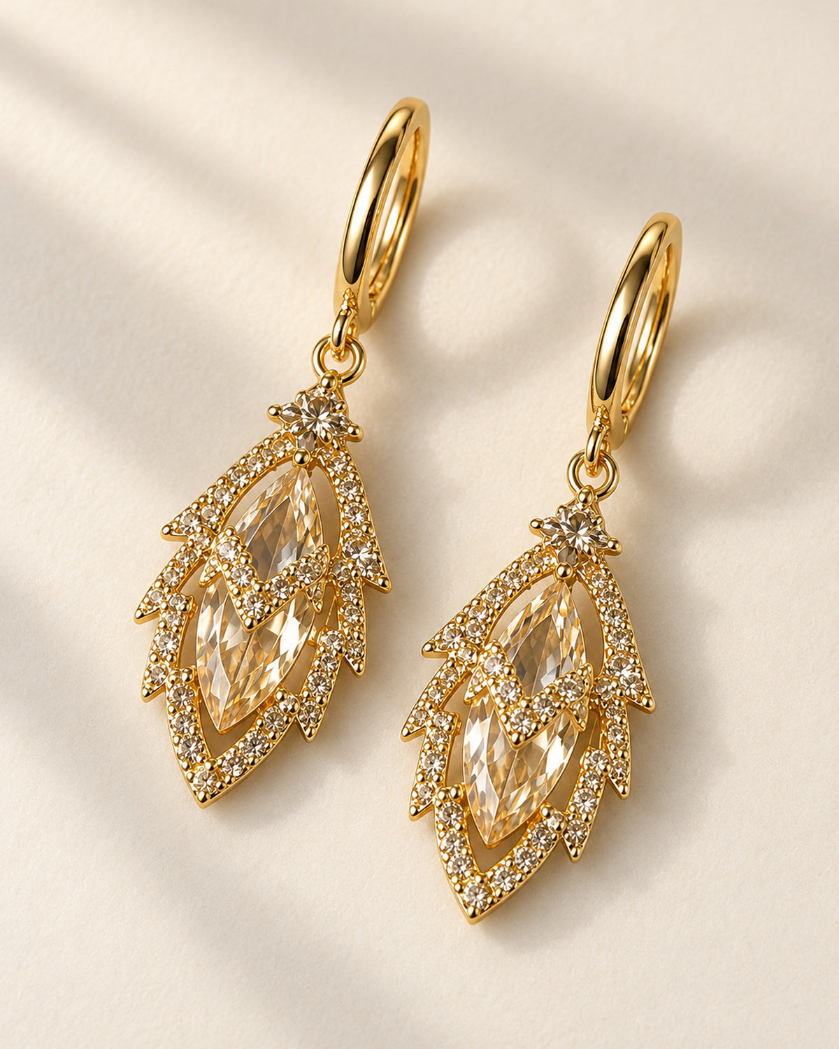 Iris zircon leaf drop earrings on gold-tone huggie hoops in Gold, three-quarter view