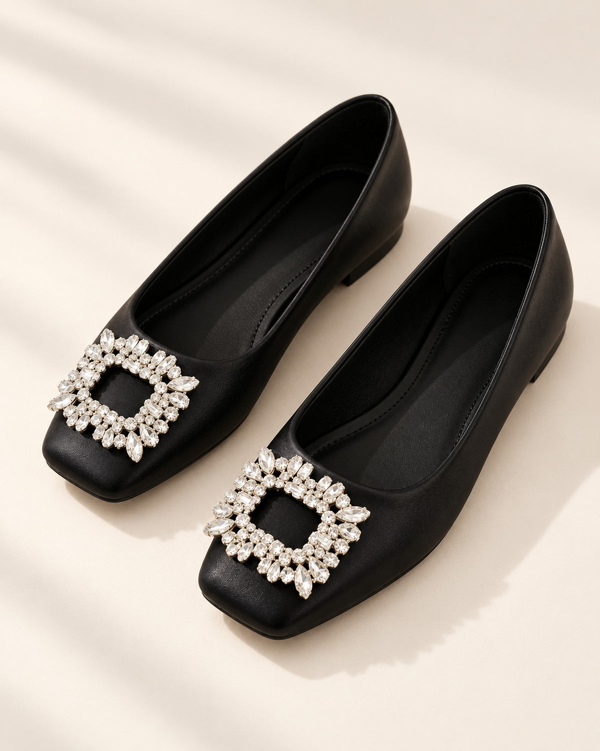 Lysiane square-toe flat with rhinestone buckle in Black, three-quarter view