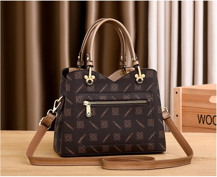 Isaline — Bolso Cruzado Estructurado Dorado