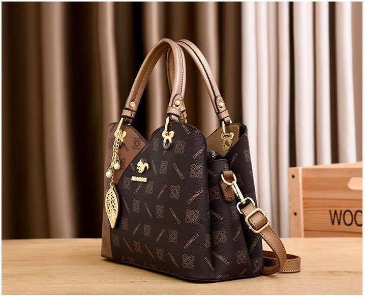 Isaline — Bolso Cruzado Estructurado Dorado