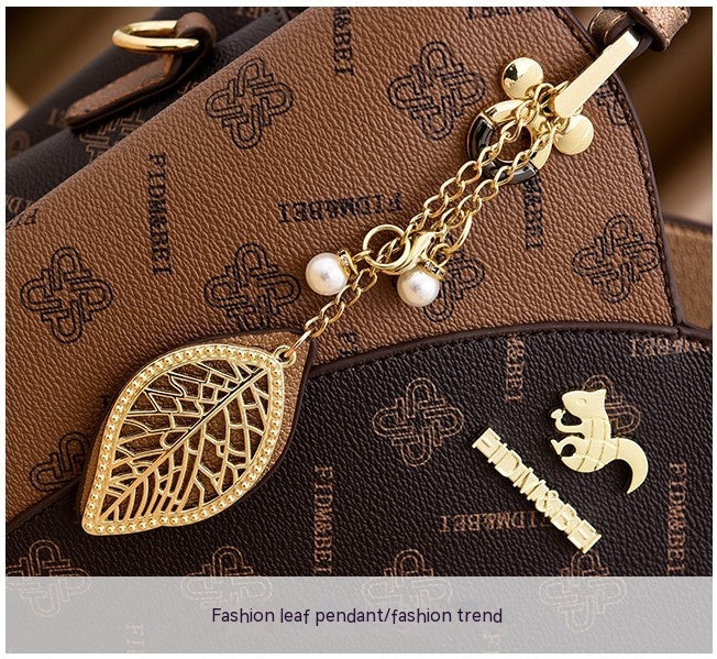 Isaline — Bolso Cruzado Estructurado Dorado