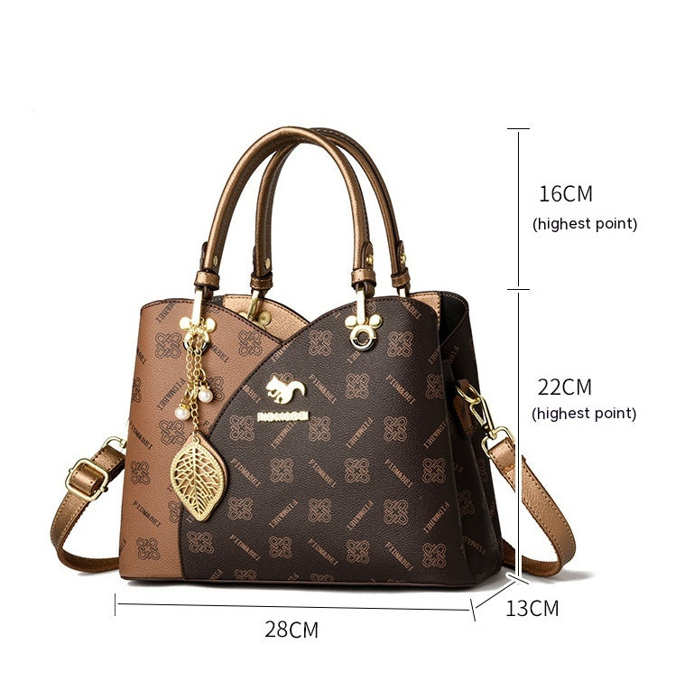 Isaline — Bolso Cruzado Estructurado Dorado