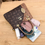 Isaline — Bolso Cruzado Estructurado Dorado